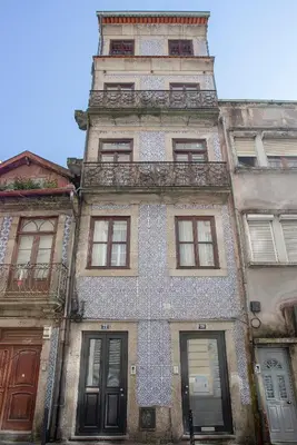 a tall building with a tower on top of it at Liiiving in Porto - Historic Clérigos Apartments in Porto