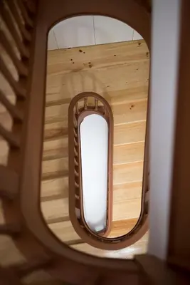 anorthole view of a spiral staircase in a building at Casas do Loureiro in Porto