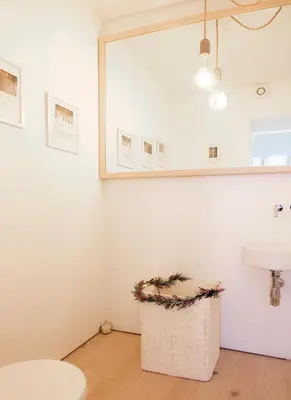 a bathroom with a sink and a mirror at OHH - Mouzinho Deluxe Apartment in Porto