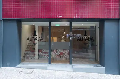 a store front window of a store at Almada Wine House - Tourism Apartments in Porto