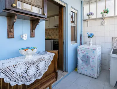 a patio with a table and chairs on a balcony at Apartment Rustic Oporto in Porto