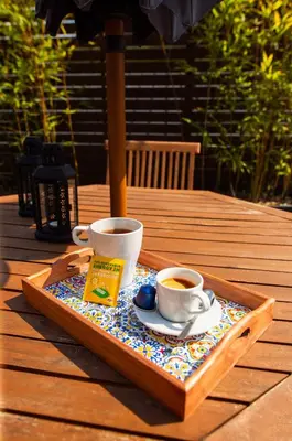 two cups of coffee on a tray on a table at Bonjardim Terrace in Porto