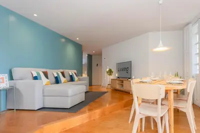 a bathroom with a toilet and a sink at Liiiving in Porto - Santa Catarina Luxury Apartment in Porto