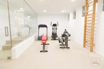 a gym with treadmills and exercise equipment in a room at Oporto Ceuta Residences - Residence 2 by We Do Living in Porto