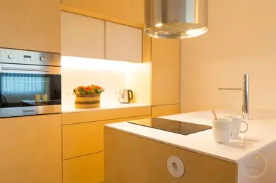 a kitchen with a sink and a microwave at Oporto Ceuta Residences - Residence 2 by We Do Living in Porto