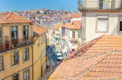 an overhead view of a city with buildings and cars at Porto Moments Apartments by Portugal Collection in Vila Nova de Gaia