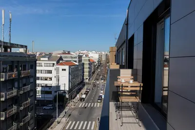 a view of a city street from a building at Oporto up Town in Porto