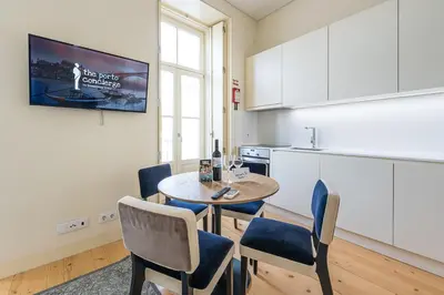 a bathroom with a shower and a sink at GuestReady - La Maison Aires Gouveia in Porto