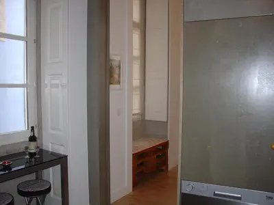 a hallway with a walk in shower in a room at Downtown Historical Apartment in Porto