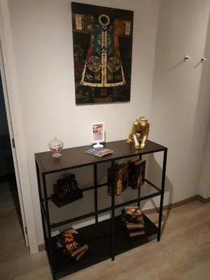 a black table in a room with a picture on the wall at ML Apartments Avenue in Porto