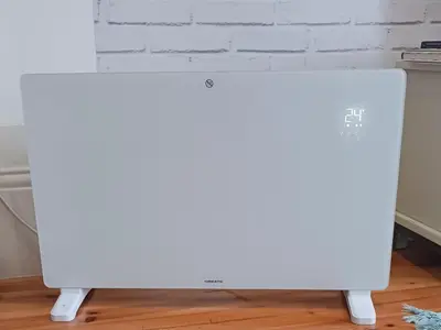 a flat screen tv sitting on top of a shelf at Casa da Andorinha, charm apt Porto Bolhão in Porto