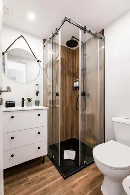 a bathroom with a shower and a toilet at Porto Essence in Porto