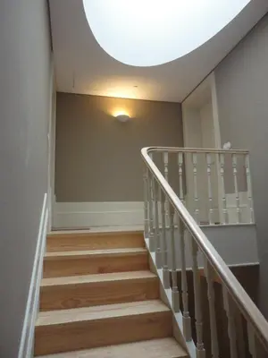 a hallway with stairs with a round ceiling at Oporto Like Home IV - Mezzanine in Porto