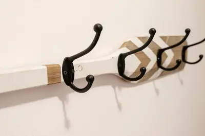 a knife holder hanging on a wall at apartment with balcony in the square in Porto