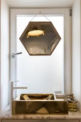a kitchen sink in front of a door at BOUTIQUE Rentals - Little Treasure Studio in Porto