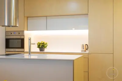 a kitchen with a sink and a microwave at Oporto Ceuta Residences - Residence 1 by We Do Living in Porto