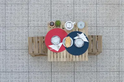an overhead view of a table with plates of food at Vale71house in Porto