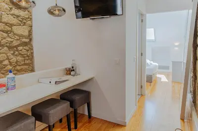 a bathroom with a shower and a sink at Oporto Gardens - Historic House, by Hopstays in Porto