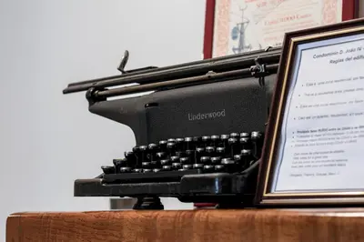 an old typewriter sitting on top of a table at D João IV Apartment With Terrace by LovelyStay in Porto