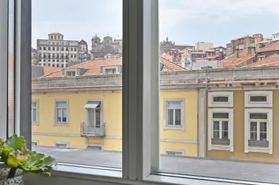a view of a city from a window at Villa Mouzinho by ON Apartments in Porto