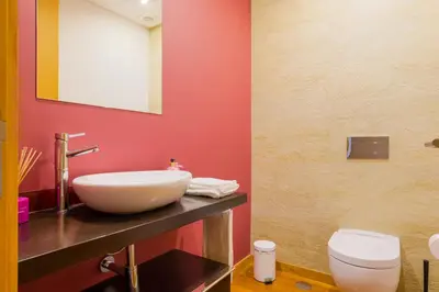 a bathroom with a sink and a toilet at Pretty Porto Apartment by SOULSHARING.PORTO in Porto