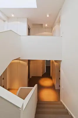 a view of the hallway of a building with a staircase at bnapartments Palacio in Porto