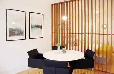 a dining room with a white table and chairs at HM - Carlos Alberto Apartment 2 in Porto