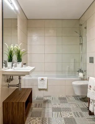 a bathroom with a sink and a tub and a toilet at 296 Heritage Apartments in Vila Nova de Gaia