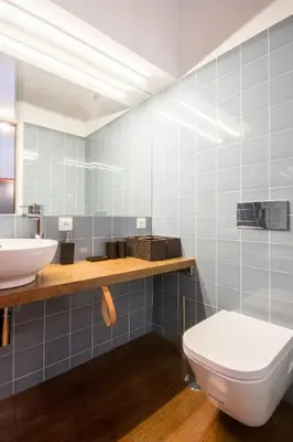 a bathroom with a white toilet and a sink at Cozy Stay - Cedofeita 436 in Porto