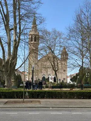 a group of people standing in front of a building at Urban Views Townhouse Infante in Porto