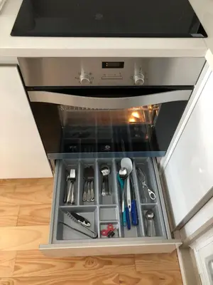 a drawer in a kitchen with tools in it at URBAN VIEWS Terrace - Duplex Apartment 