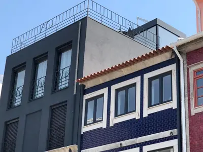 a building with a balcony on top of it at URBAN VIEWS Terrace - Duplex Apartment 