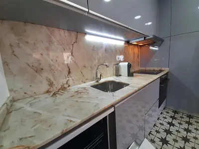 a kitchen with a sink and a counter top at Porto Soul by Flat in Porto in Porto