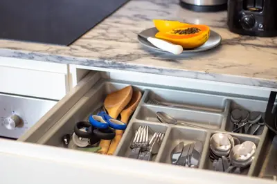 a drawer in a kitchen with a sink at LovelyStay - Dirk Apartment Almada 3º T in Porto