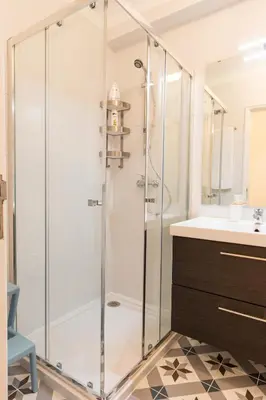 a shower with a glass door in a bathroom at Porto Haven - Marquês Downtown in Porto