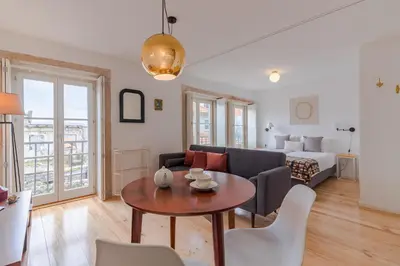 a living room with a couch and a table at YOUROPO - The Tower in Porto