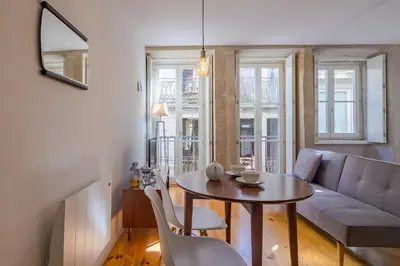 a living room with a table and a couch at YOUROPO - The Tower in Porto