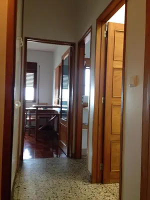 a room with a bed and a mirror at Boavista YourHome in Porto