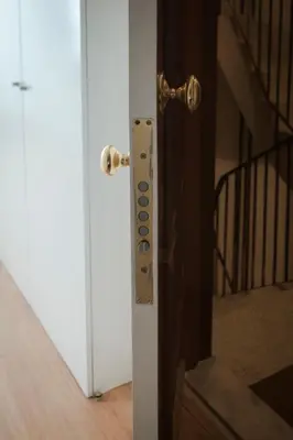 a close up of a door with a knob at Nightingale Apartments in Porto