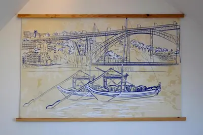 a painting of a boat in the water with a bridge at InvictaViews Loft in Vila Nova de Gaia