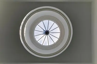 a round window in a room with a ceiling at Casa da Cordoaria by Oporto Soul in Porto