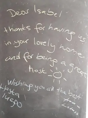 a blackboard with writing on it with writing on it at Oporto Memory Houses 7 in Porto