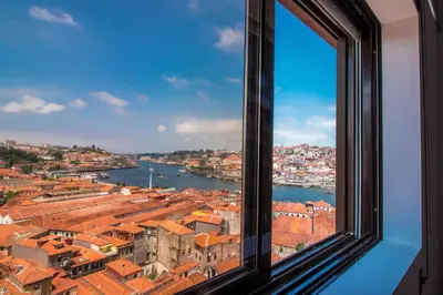 a view of a city from a window at House General Torres in Vila Nova de Gaia