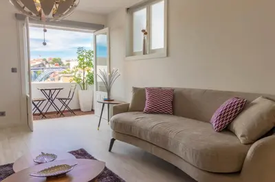 a living room with a couch and a table at House General Torres in Vila Nova de Gaia