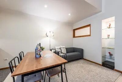 a living room with a table and a couch at GuestReady - Amaryllis Apartment in Porto