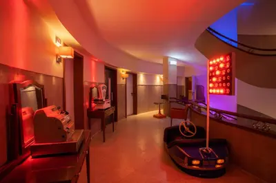 a room with a room with a bowling alley at Pao de Acucar Hotel in Porto