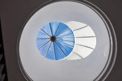 a round window with a blue sky in it at bnapartments Rio in Porto