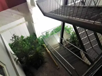 an overhead view of a staircase in a building at Oporto Delight 1 Luxury Apartment in Historic Center with Balcony Max 4 p in Porto