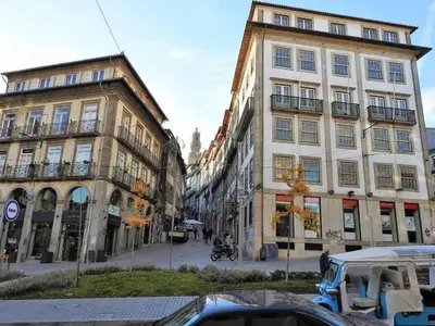 a group of buildings on a city street at Oporto Delight 1 Luxury Apartment in Historic Center with Balcony Max 4 p in Porto