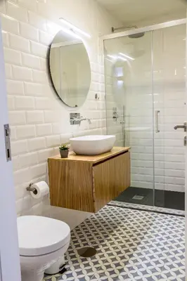 a bathroom with a sink and a toilet and a mirror at Formosa 168 by Guestify in Porto